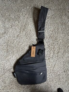 NWT Wander Anti-theft Black and Gray Sling Bag